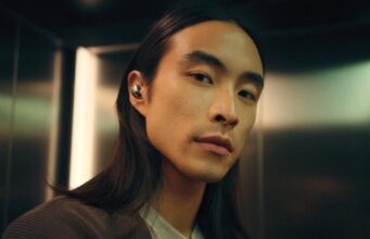 Sennheiser Momentum True Wireless 5: Specs and Price Person wearing Sennheiser Momentum True Wireless 5 earbuds in white