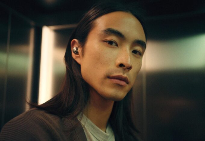 Sennheiser Momentum True Wireless 5: Specs and Price Person wearing Sennheiser Momentum True Wireless 5 earbuds in white