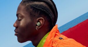 Pixel Buds Pro 2 in the new Olive finish worn outdoors