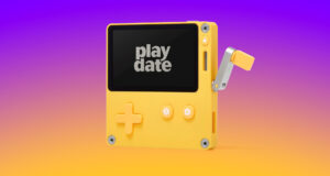 A yellow Playdate handheld game console with its crank on a purple-to-orange gradient background