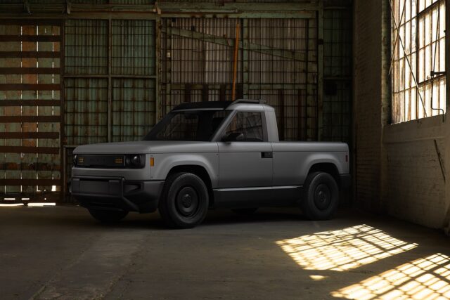 slate-truck-featured Gray Slate Truck parked in a warehouse with sunlight on the floor