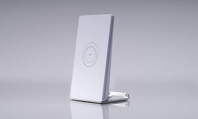starlink-router-mini-featured Starlink Router Mini standing on a metal kickstand