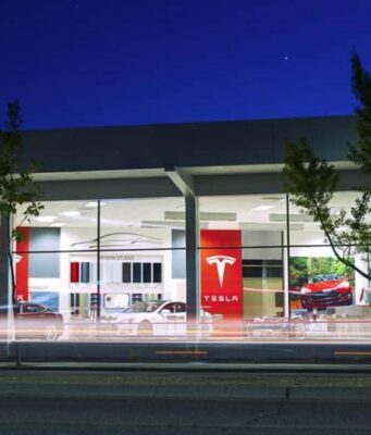 Tesla China Door-Handle Recall Covers Nearly 3 Million Cars Tesla vehicle at an official Tesla annual service and recall support hub, illustrating the Tesla China door-handle recall