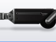 ASUS Oxiis E250G1 Intelligent Bike Booster shown in profile with its seatpost clamp and drive roller