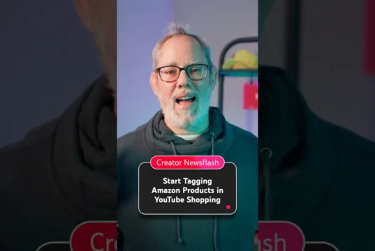Bearded presenter in glasses with on-screen text about YouTube Amazon product tags.