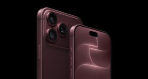 iPhone 18 Pro in burgundy showing the rear camera system and the smaller Dynamic Island