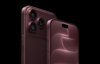 iPhone 18 Pro Debuts With A20 Pro Chip and a Smaller Dynamic Island iPhone 18 Pro in burgundy showing the rear camera system and the smaller Dynamic Island