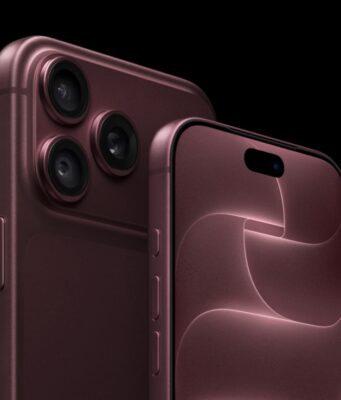 iPhone 18 Pro Debuts With A20 Pro Chip and a Smaller Dynamic Island iPhone 18 Pro in burgundy showing the rear camera system and the smaller Dynamic Island