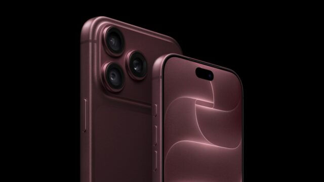 iPhone 18 Pro in burgundy showing the rear camera system and the smaller Dynamic Island
