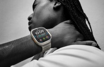 Apple Watch Ultra 4 Adds 50-Hour Battery and Health Sensing Apple Watch Ultra 4 on a wrist showing a readiness score of 8 and Go For It