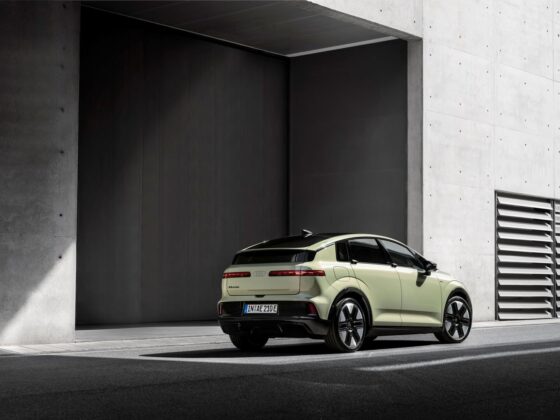 Audi A2 e-tron rear three-quarter view showing the full-width LED light bar