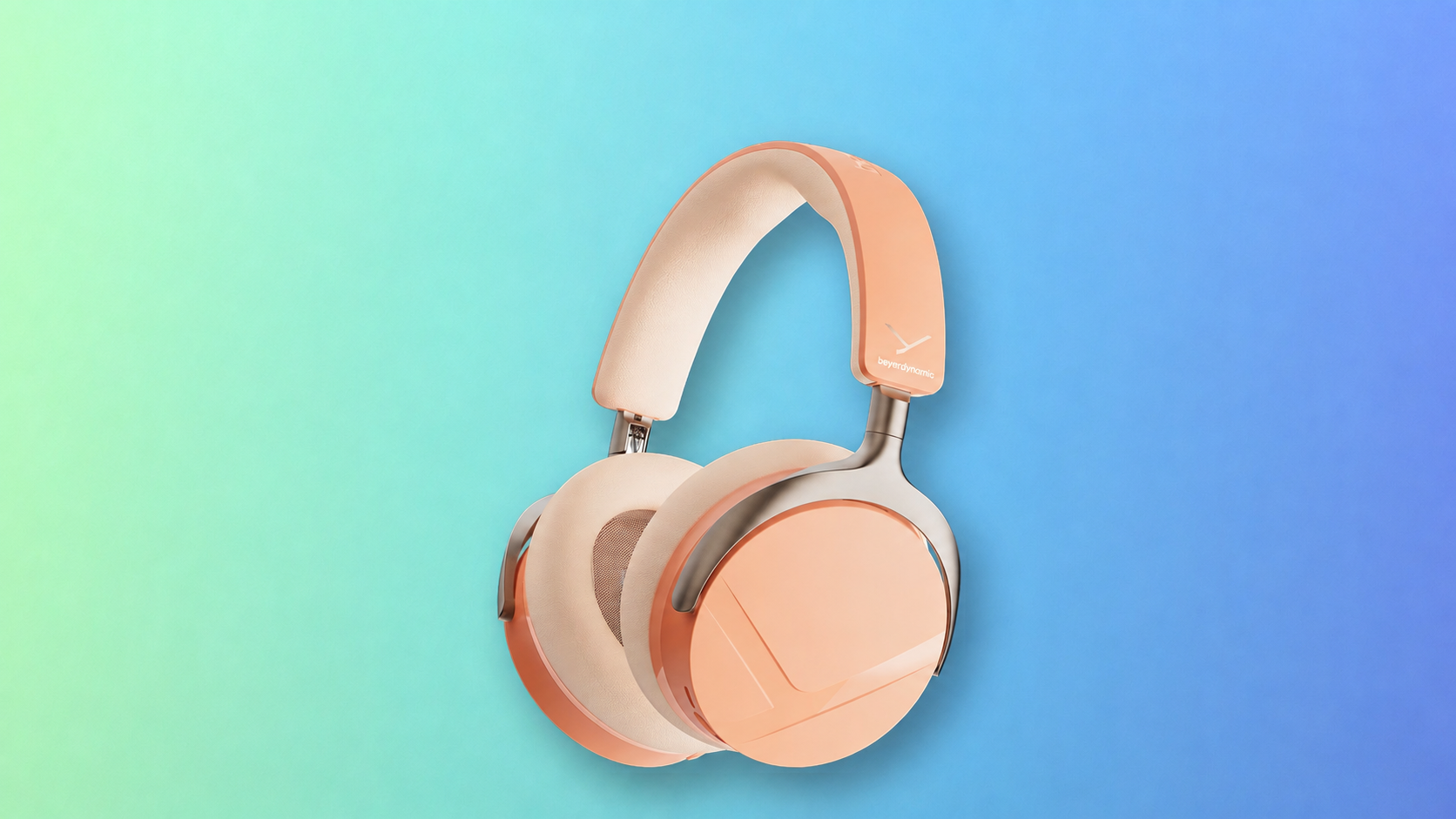 Beyerdynamic Aventho Y headphones in Peach Blush on a blue and mint background