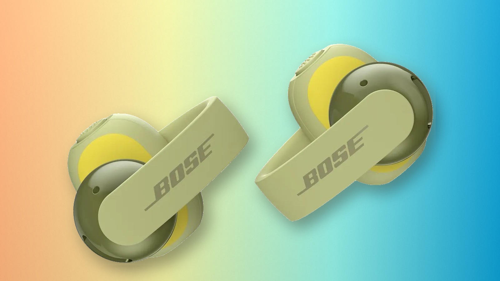 Bose Sport Open Earbuds in Eucalyptus Green on a cyan and peach background