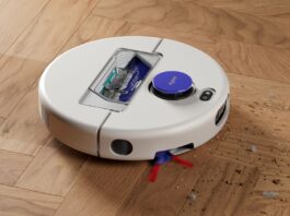 Dyson Nurovi R1 Dry robot vacuum collecting debris on a wood floor
