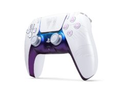 White Grand Theft Auto VI limited-edition DualSense controller with pink buttons and iridescent blue center.