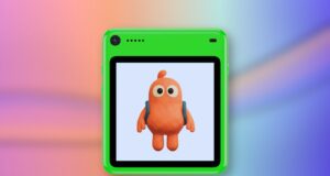 Freckle phone in green with an orange character on its screen against a coral and blue editorial background