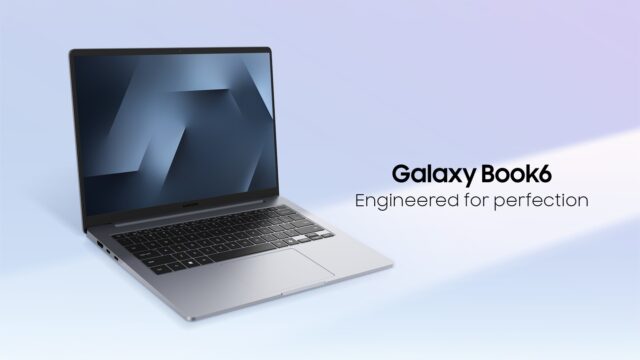 Open gray Galaxy Book6 on a light blue backdrop, screen and keyboard facing the camera