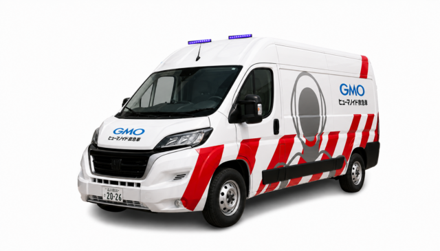gmo-humanoid-ambulance-exterior-official GMO humanoid ambulance maintenance van with red stripes and purple roof lights