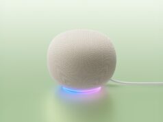 Google Home MCP Opens Early Access White Google Home Speaker on a mint backdrop with a blue-to-purple light ring and power cable
