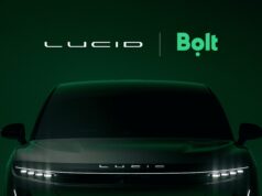 Lucid Bolt Robotaxi Deal Targets 25,000 Driverless Cars Across Europe Lucid and Bolt logos above the front of a dark Lucid SUV on a deep green background