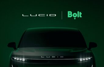 Lucid Bolt Robotaxi Deal Targets 25,000 Driverless Cars Across Europe Lucid and Bolt logos above the front of a dark Lucid SUV on a deep green background