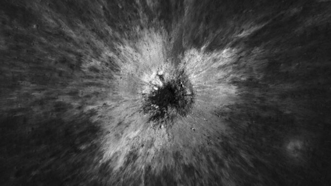 McGetchin Crater: NASA’s Moon Orbiter Finds a Once-in-a-Century Impact Overhead black-and-white Lunar Reconnaissance Orbiter view of McGetchin crater, a dark pit surrounded by a bright starburst of ejected debris