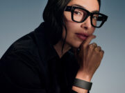 Woman wearing Meta Ray-Ban Display glasses and Neural Band
