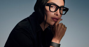 Meta hologram Hits Ray-Ban Display This Fall Woman wearing Meta Ray-Ban Display glasses and Neural Band