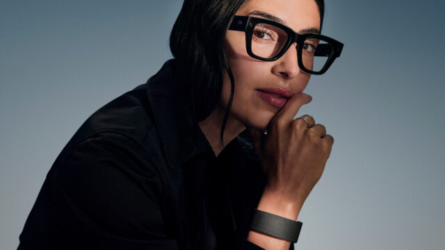 meta-hologram-ray-ban-display-header Woman wearing Meta Ray-Ban Display glasses and Neural Band