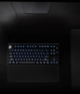 Logitech G PRO Series Adds Superstrike, Rapid, Lightspeed, and Control Logitech G PRO Series 2026 black desk with headset, Rapid keyboard, Superstrike mouse, and Control pad