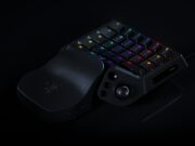 Razer Tartarus V2 Pro one-handed gaming keypad with numbered RGB keys, a thumbstick and a leather-look wrist rest on a black background