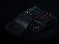 Razer Tartarus V2 Pro one-handed gaming keypad with numbered RGB keys, a thumbstick and a leather-look wrist rest on a black background