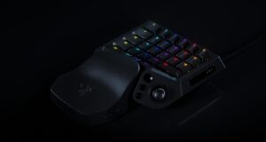 Razer Tartarus V2 Pro one-handed gaming keypad with numbered RGB keys, a thumbstick and a leather-look wrist rest on a black background