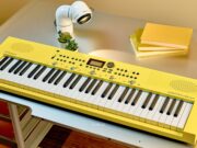 Roland GO:KEYS 3 Minion yellow keyboard with Minions illustrations on a desk