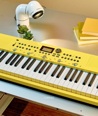 Roland GO:KEYS 3 Minion Lets Kids Play Minions Voices for $449.99 Roland GO:KEYS 3 Minion yellow keyboard with Minions illustrations on a desk