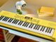 Roland GO:KEYS 3 Minion yellow keyboard with Minions illustrations on a desk