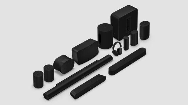 sonos-27-system-lineup Black Sonos speakers, soundbars, sub, and headphones arranged on a light gray studio background