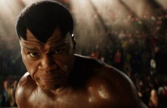New Street Fighter Movie Trailer Teases the World Warrior Tournament Fighter in a packed arena in an official still from the new Street Fighter movie trailer