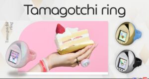 Three Tamagotchi ring colorways and a hand wearing the pearlescent pink model beside a cake slice