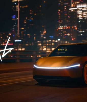 Tesla Cybercab robotaxi rides are live in Austin Gold Tesla Cybercab driving on a city highway at night with a light bar across the nose