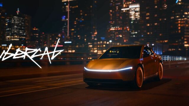 tesla-cybercab-austin Gold Tesla Cybercab driving on a city highway at night with a light bar across the nose