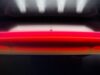 Tesla's official 'Go for launch' reveal graphic showing the red second-generation Roadster under vertical launch-pad lighting with the date 10.01