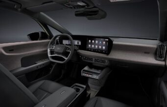 Audi A2 e-tron compact electric hatchback in Pistachio green, front three-quarter view