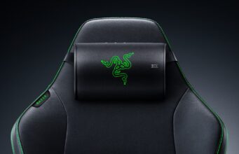 Razer Clio X Is a $110 Speaker Head Cushion for Gaming Chairs Razer Clio X wireless speaker head cushion strapped to the headrest of a black Razer gaming chair