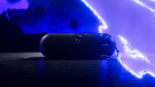 Beats Pokémon Pill - AI-relit editorial hero AI-relit illustration of the Beats Pokémon Pill teaser, showing the speaker and strap against blue electrical effects