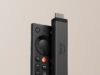 Fire TV Stick 4K Costs $59.99, but Prime Big Deal Days Cuts It to $29.99 Fire TV Stick 4K standing next to the new Fire TV Remote against a beige background