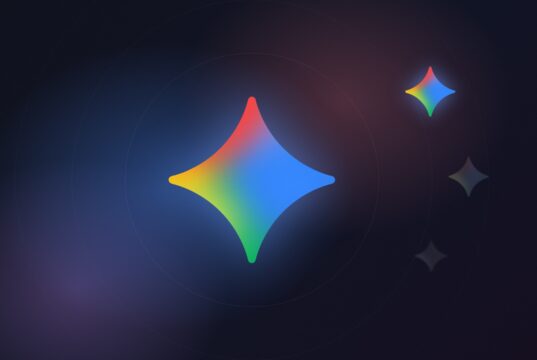 Glowing Gemini sparkle icon on a dark blue and violet background, with two smaller faded sparkles beside it