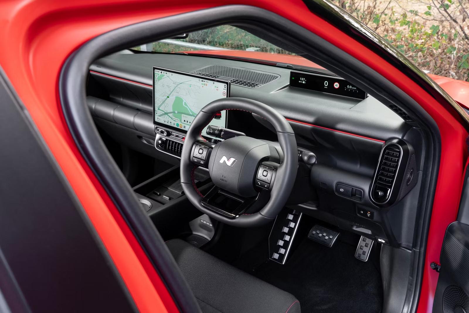 Hyundai IONIQ 3 N Line Evo cabin with the Pleos Connect display and N-branded steering wheel