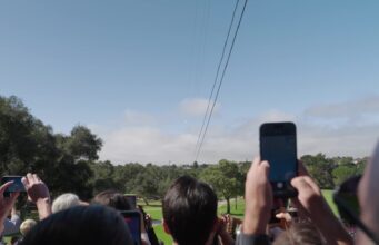 People watch the Project Suncatcher Transporter-18 launch from the ground