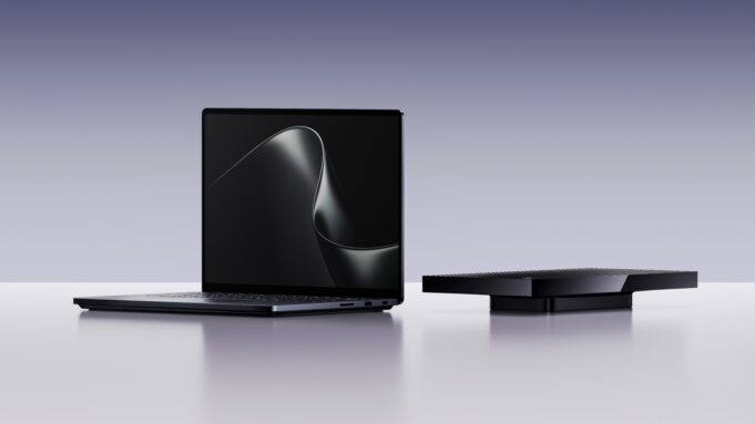 Surface Laptop Ultra open beside the compact Surface RTX Spark Dev Box on a pale lavender studio background